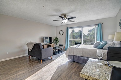 Step into this beautifully upgraded 2nd-floor studio in Orchid