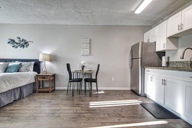 Step into this beautifully upgraded 2nd-floor studio in Orchid