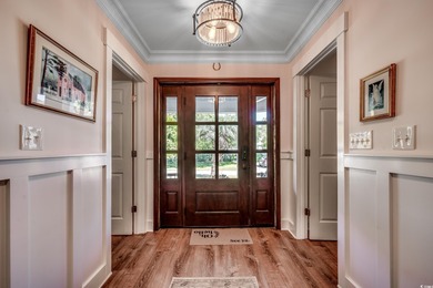 Experience the essence of coastal living in this elegant home