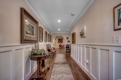 Experience the essence of coastal living in this elegant home