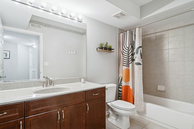 Rarely available corner unit with peaceful courtyard views and