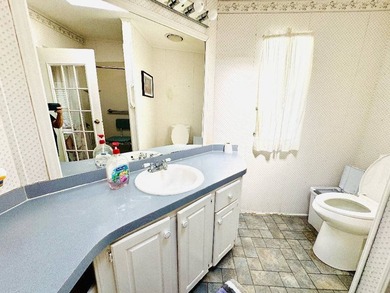 Spacious + Stunning Curb Appeal with 2-Bed, 2-Bath in a 55+