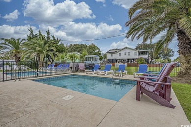 Welcome to your coastal sanctuary at 827-B North Waccamaw Drive