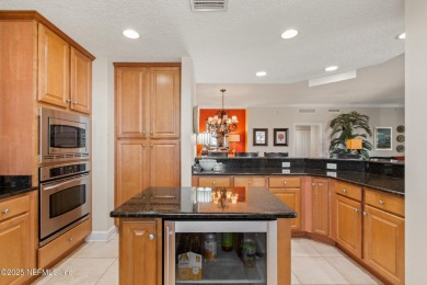 A coveted corner unit with 400sq ft of screened porch has come