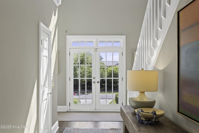 Welcome to 4 Sandy Point, a rare opportunity to own a