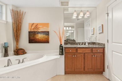 A coveted corner unit with 400sq ft of screened porch has come