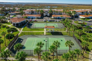 A coveted corner unit with 400sq ft of screened porch has come