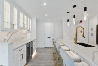 Experience luxury coastal living at its finest in this fully