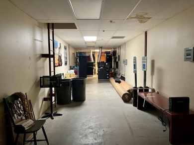 This is a 4-plex, stadium seated, theatre of approx 10,700 sf