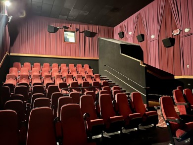 This is a 4-plex, stadium seated, theatre of approx 10,700 sf