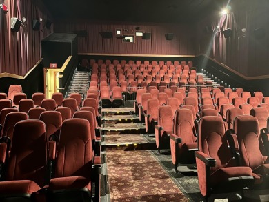 This is a 4-plex, stadium seated, theatre of approx 10,700 sf
