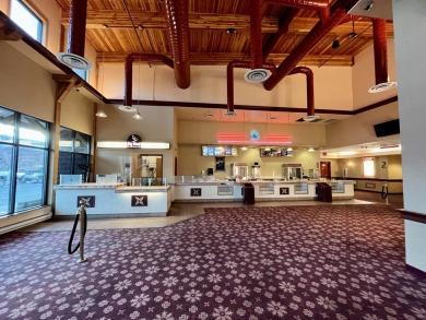 This is a 4-plex, stadium seated, theatre of approx 10,700 sf