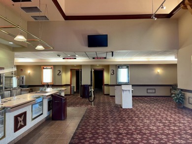 This is a 4-plex, stadium seated, theatre of approx 10,700 sf