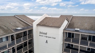 Enjoy island life with this oceanside 3 bedroom 2 1/2 bath condo