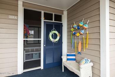 Enjoy island life with this oceanside 3 bedroom 2 1/2 bath condo