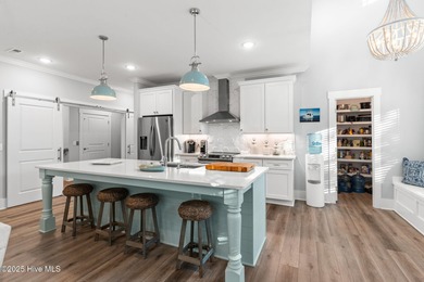 230 NE 36th Street is a custom-built 2021 coastal home crafted