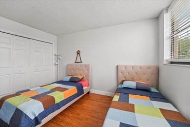 Just listed in the highly desirable Country Club Apartments at