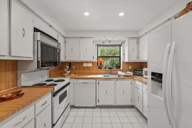 Just listed in the highly desirable Country Club Apartments at