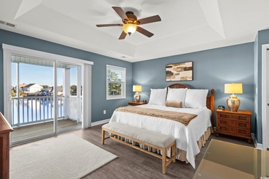 Welcome to coastal luxury living in the highly sought-after