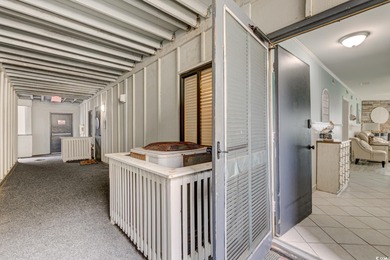 What a find! Grab a rocking chair to relax on your oceanfront