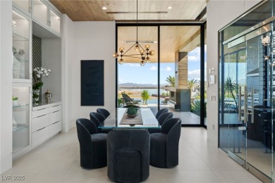 Exquisite lake view custom estate, tucked behind triple gates in