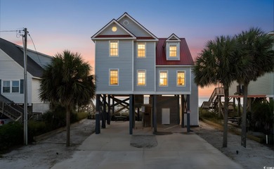 Welcome to 324 S Waccamaw Dr --- a true oceanfront escape in the