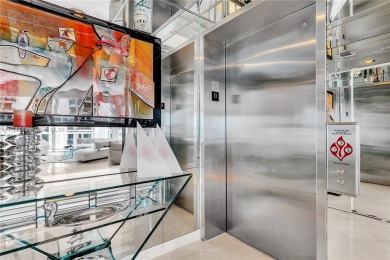 Step in your private elevator & foyer directly into this elegant