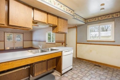 **Welcome to this inviting four-bedroom ranch home, perfectly