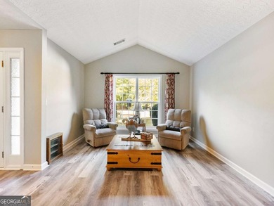 Impeccably updated and ideally situated, this stunning 4-bedroom