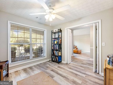 Impeccably updated and ideally situated, this stunning 4-bedroom