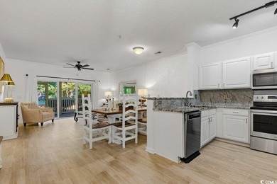 This stunning, designer-furnished first-floor condo features 3