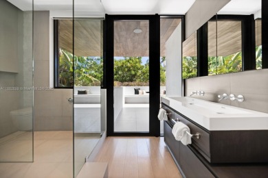 Waterfront luxury in this low impact Modern, meticulously