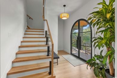 Experience refined coastal living in this private, ocean-view