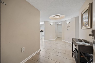 This fully furnished 3BR/3BA end unit offers a stunning