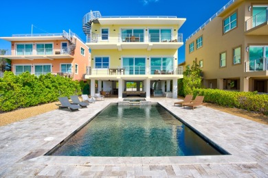 Welcome to 2010 Sombrero Beach Rd.  This contemporary oceanfront