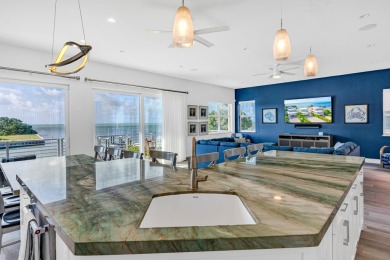 Welcome to 2010 Sombrero Beach Rd.  This contemporary oceanfront