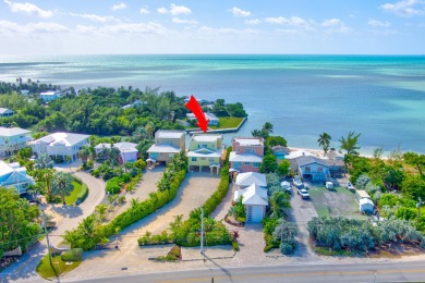 Welcome to 2010 Sombrero Beach Rd.  This contemporary oceanfront