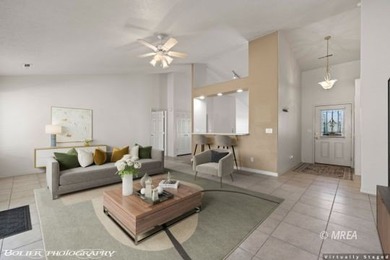 Welcome to 871 Falcon Glen Drive, a charming single-family home