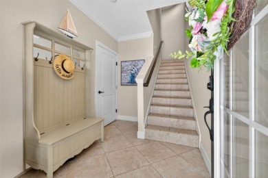 Impeccable coastal Luxury living within this premier gated