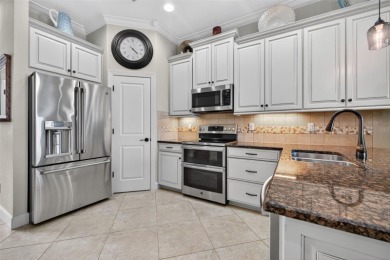 Impeccable coastal Luxury living within this premier gated