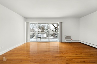 Discover effortless downtown living in this beautifully updated