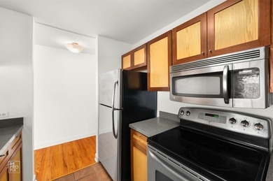 Discover effortless downtown living in this beautifully updated