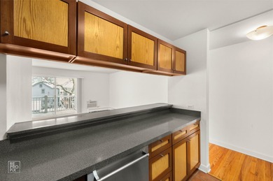 Discover effortless downtown living in this beautifully updated