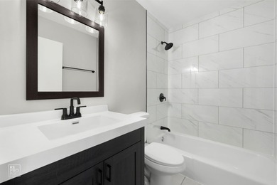 Discover effortless downtown living in this beautifully updated