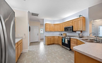 Gorgeous home in a vibrant 55+ community nestled near the