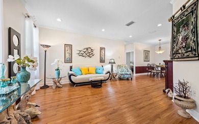 Gorgeous home in a vibrant 55+ community nestled near the