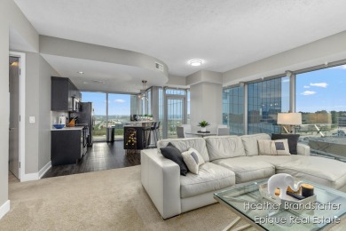 Welcome to this stunning luxury condo perched on the 11th floor
