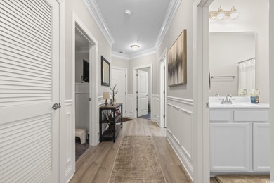 Built in 2024, this exquisite second-floor, end unit combines