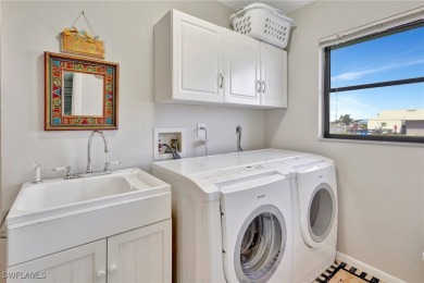 This home is an outdoor oasis in paradise located in an