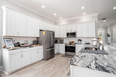 Welcome to 1203 N Ocean Blvd, a stunning 5-bedroom, 5.5-bath